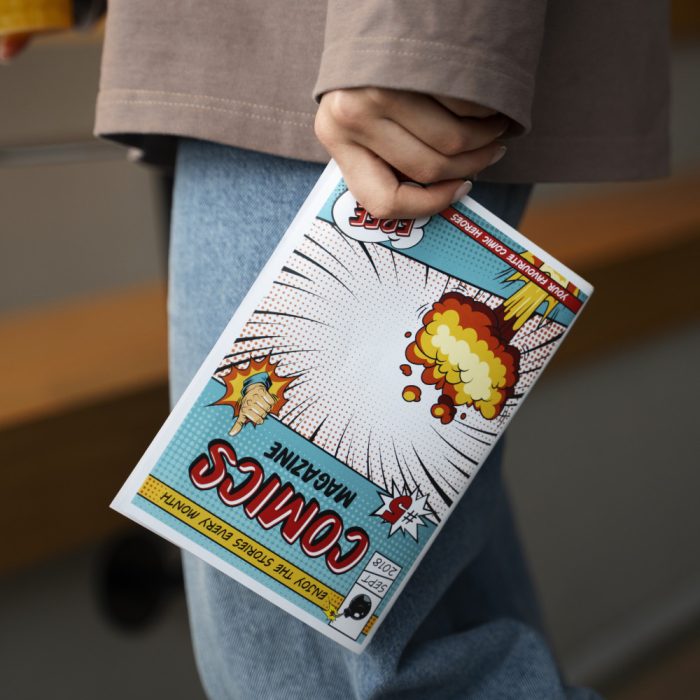 side-view-woman-holding-comics